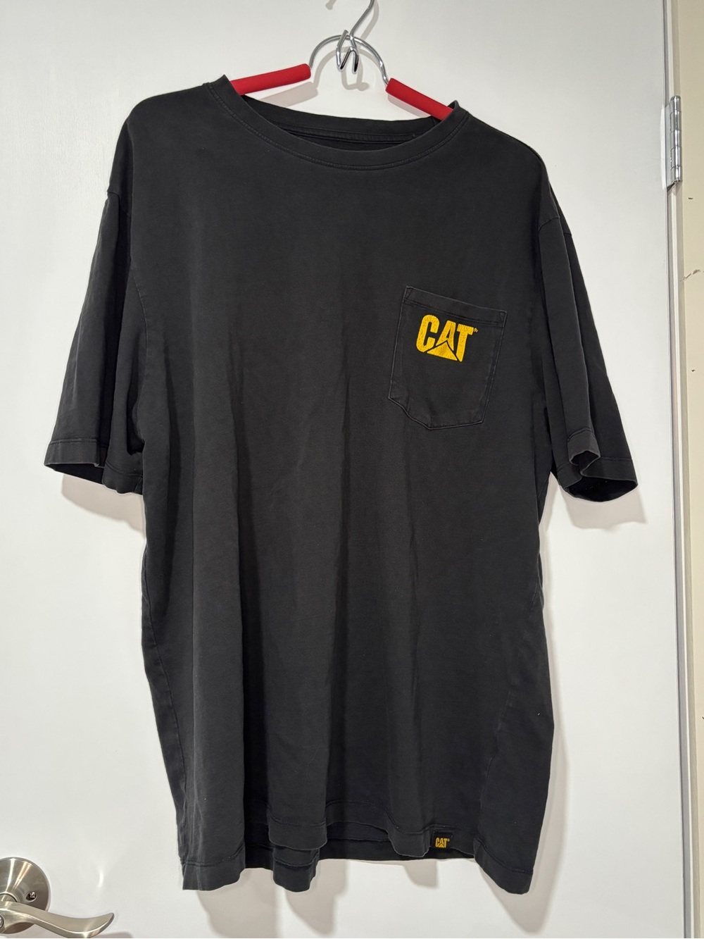 CAT Men's Black Short-Sleeve Pocket Tee with Yellow Logo